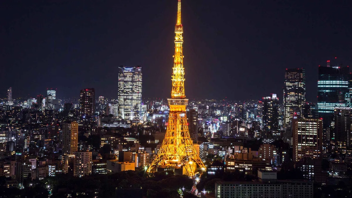 Visitors looking out over the Tokyo skyline from Tokyo Tower's Main Deck, Tokyo Tower admission ticket