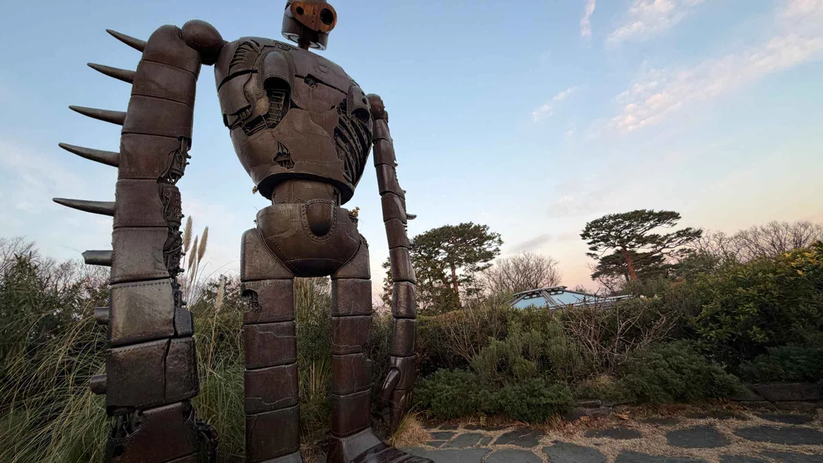 Visitors exploring whimsical exhibits inside the Ghibli Museum on a guided Mitaka tour in Tokyo